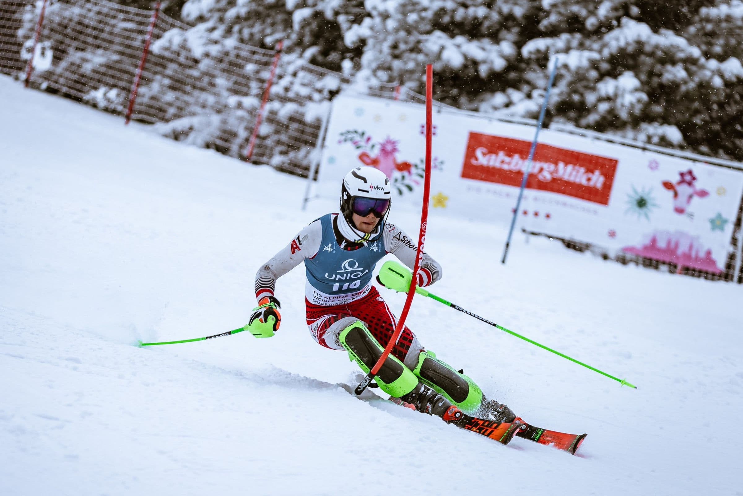 Kevin Schmidle in a slalom turn, low over the outside ski