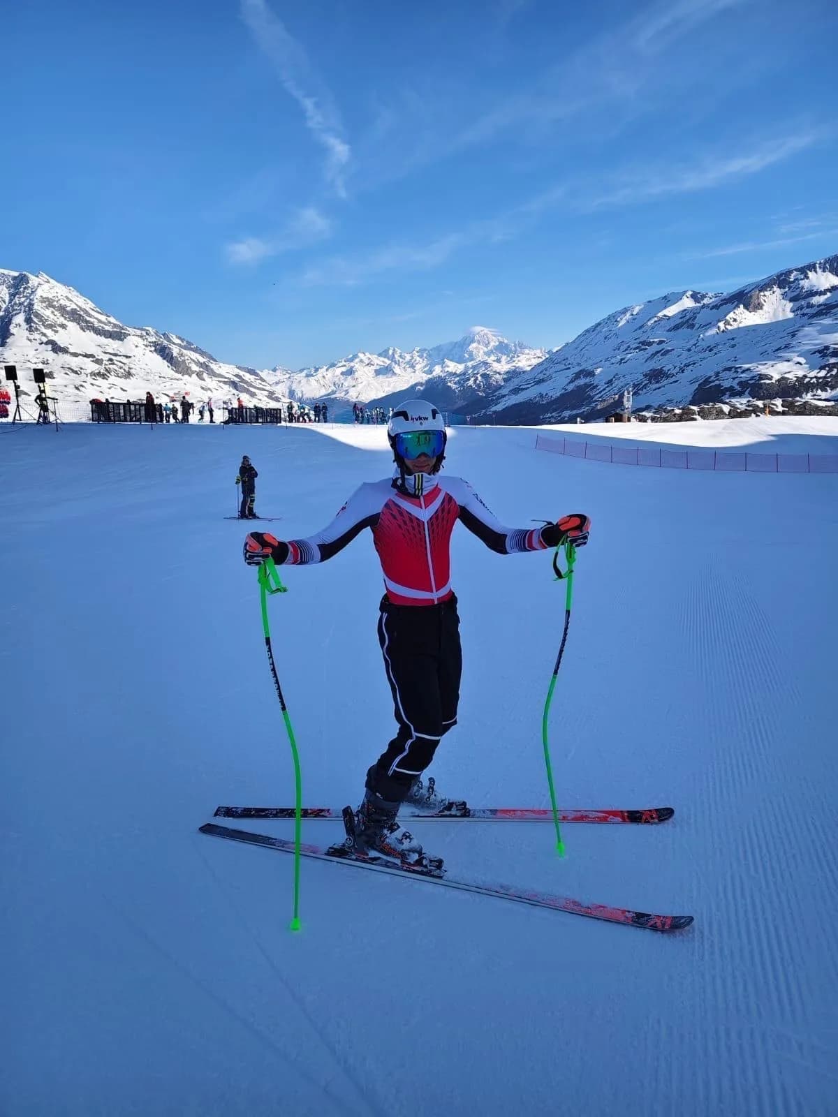 Kevin Schmidle with skis and poles on the slope